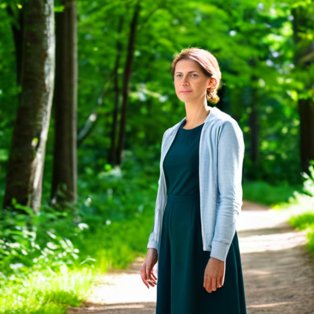 A professional woman in modest, comfortable outdoor clothing, standing on a winding forest path bathed in dappled sunlight. She has a calm, focused expression, taking a deep breath and experiencing mental clarity. Lush green trees and foliage surround her, with soft light filtering through the leaves. The scene conveys peace and restoration. perfect anatomy, correct proportions, natural pose, well-formed hands, proper finger count, natural body proportions, professional photography, high quality, safe for work, appropriate content, fully clothed, professional, family-friendly.